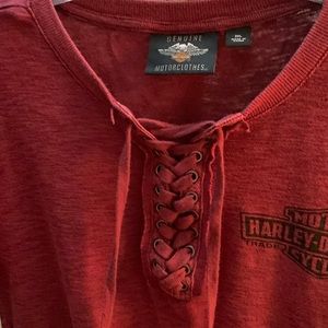 A maroon size 2X short slave Harley Davidson shirt
